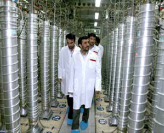 Figure 3 – Iranian President Mahmoud Ahmadinejad tours Natanz Uranium Enrichment Facility in 2008. ix 